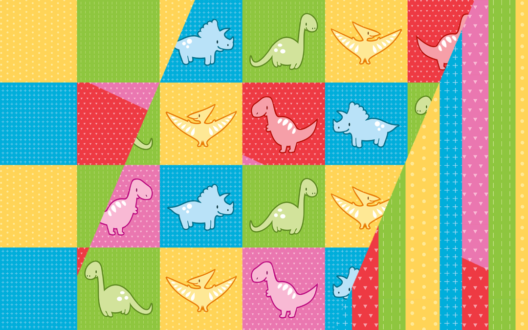 Colorful dinosaurs and pterodactyl cheater quilt